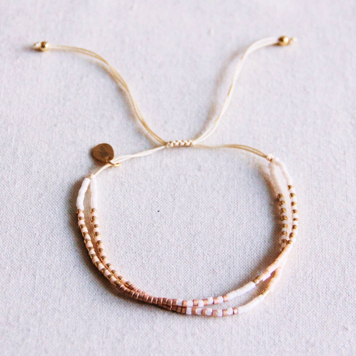 Dubbele miyuki armband - nude/wit/taupe