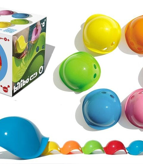 Diverse heldere kleuren van Bilibo speelgoed, getoond in close-up